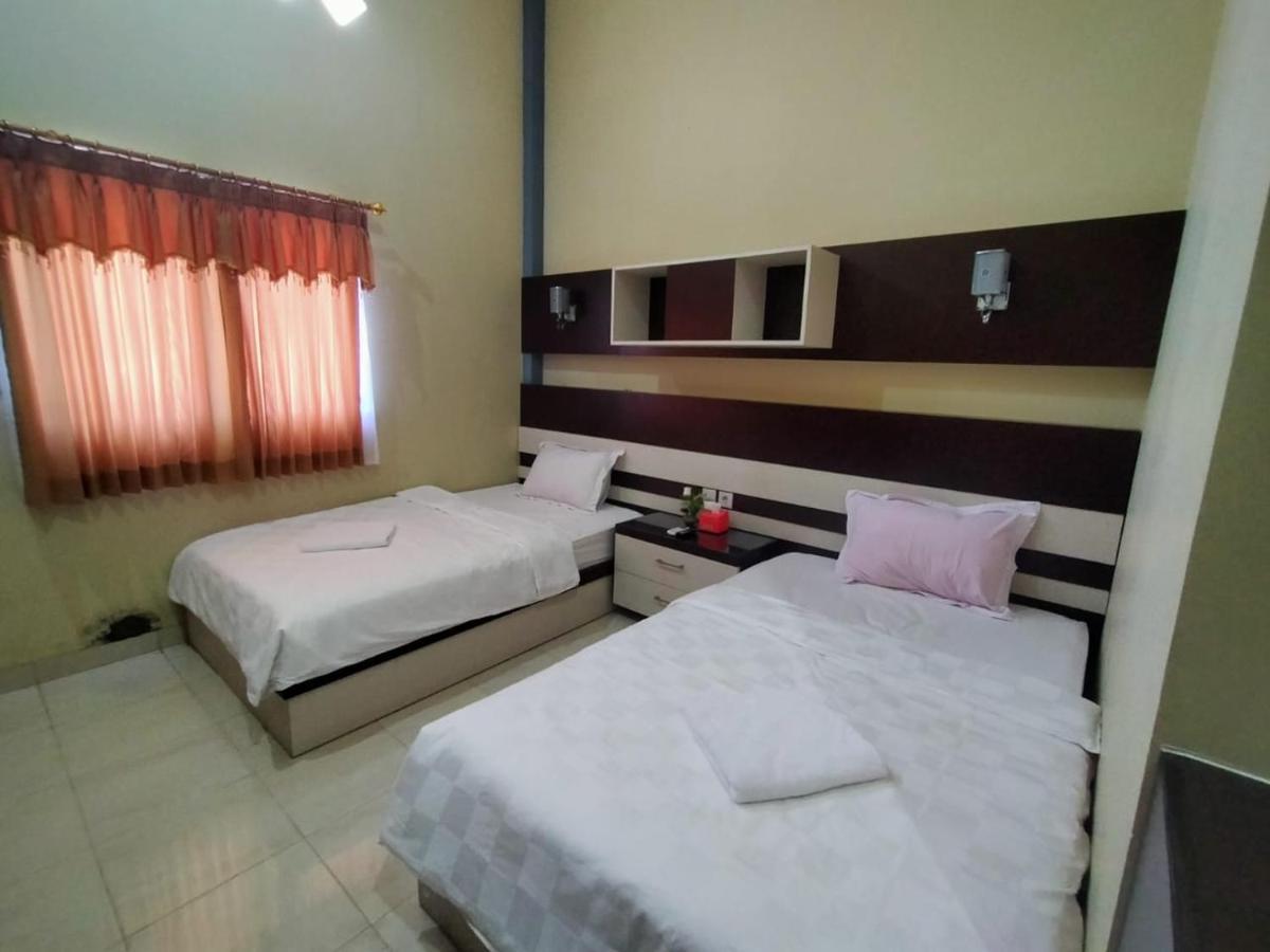 Hotel Pilar Mosa Muarawahau Extérieur photo